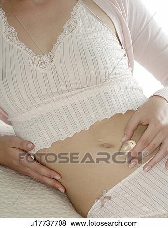 Stock Photo - Woman with rock crystal. Fotosearch