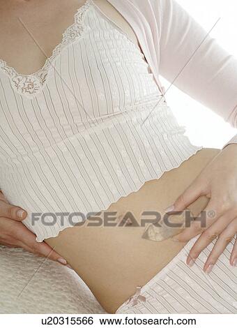 Woman with rock crystal View Large Photo Image Stock Photograph - Woman with rock crystal. Fotosearch
