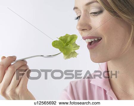 Woman with salat and fork View Large Photo Image Stock Image - Woman with salat and fork. Fotosearch