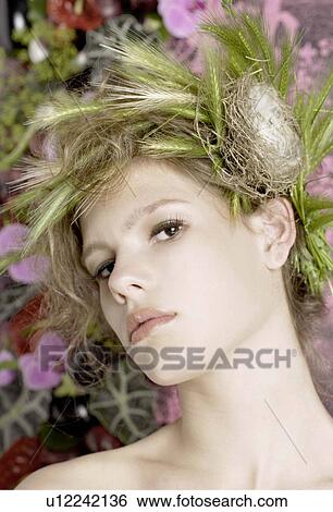 Stock Photograph - Woman with special hair styling. Fotosearch