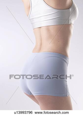 Woman with sportswear, waist and buttocks View Large Photo Image Stock Photograph - Woman with sportswear, waist and buttocks. Fotosearch