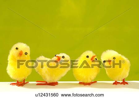 Stock Image - Yellow decorative chicks. Fotosearch