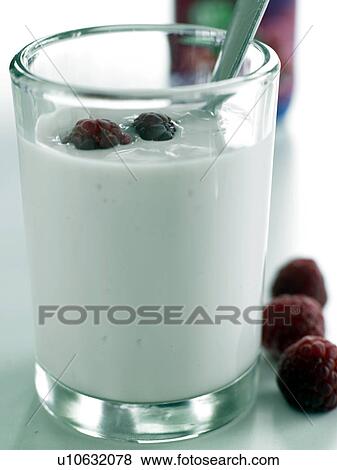 Stock Photo - Yogur with rasberries. Fotosearch