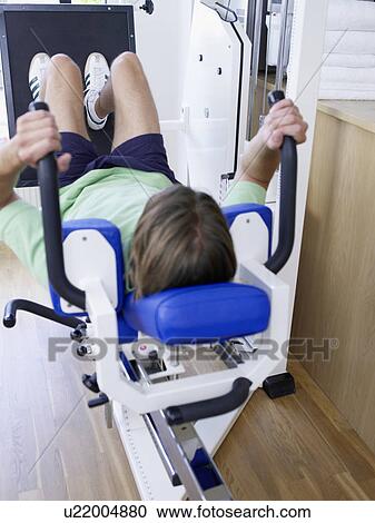 Stock Image - Young woman on training. Fotosearch