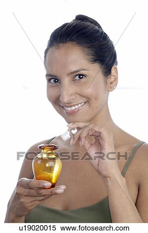 Young woman with flacon View Large Photo Image Stock Photography - Young woman with flacon. Fotosearch