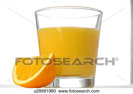 Stock Image - A glass of orange juice. Fotosearch