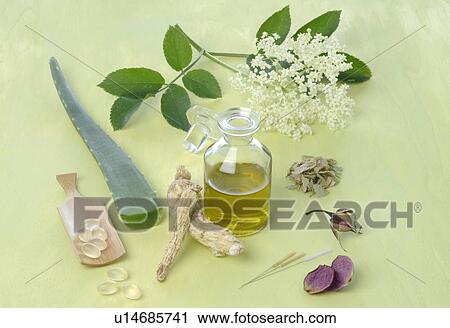Stock Image - Aloe, rose petals, oil and stone. Fotosearch
