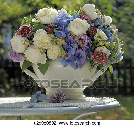 bouquet of summer flowers in blue and white View Large Photo Image Stock Image - bouquet of summer flowers in blue and white. Fotosearch