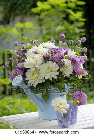 Stock Photo - Bunch of flowers in an ewer. Fotosearch