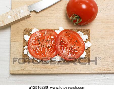 Crispbread with cream cheese, tomatos and pepper View Large Photo Image Stock Photograph - Crispbread with cream cheese, tomatos and pepper. Fotosearch