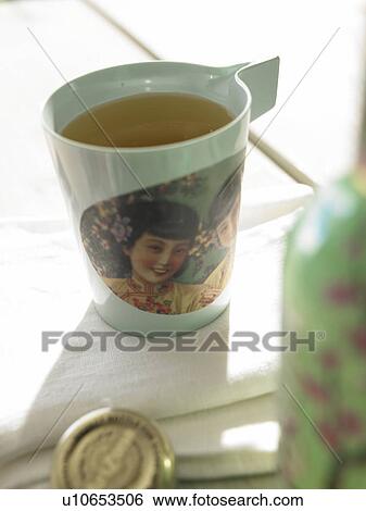 Cup of green tea View Large Photo Image Stock Photograph - Cup of green tea. Fotosearch