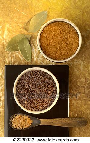 Stock Photo - Galangal, grain of mustard seed and cayenne pepper. Fotosearch