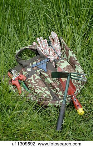 Gardening tools in grass View Large Photo Image Stock Image - Gardening tools in grass. Fotosearch
