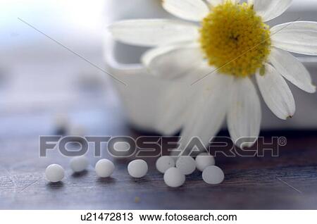 Stock Image - Homeopathy: globules. Fotosearch