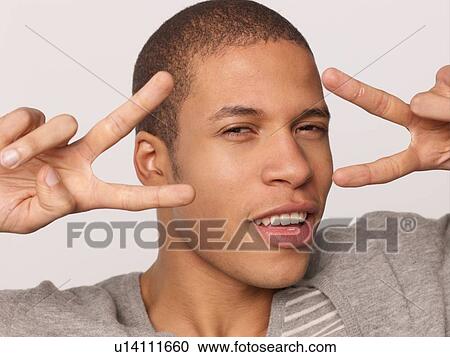 Man fooling around View Large Photo Image Stock Image - Man fooling around. Fotosearch