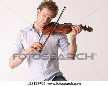 Man playing violin View Large Photo Image Stock Photo - Man playing violin. Fotosearch