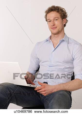 Man with Laptop View Large Photo Image Stock Photograph - Man with Laptop. Fotosearch