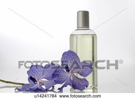 Picture - Orchid blossom and perfume. Fotosearch