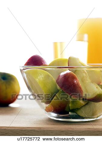 Pieces of Gloster apples in a glass bowl View Large Photo Image Stock Image - Pieces of Gloster apples in a glass bowl. Fotosearch