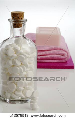 Stock Image - Pills in a bottle. Fotosearch