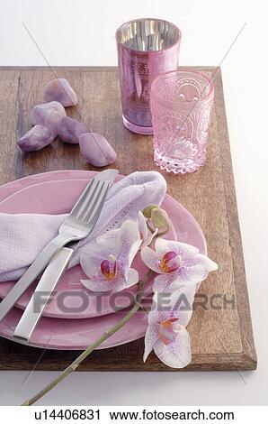Pink crockery, cutlery and orchid blossoms on a wooden board View Large Photo Image Stock Image - Pink crockery, cutlery and orchid blossoms on a wooden board. Fotosearch