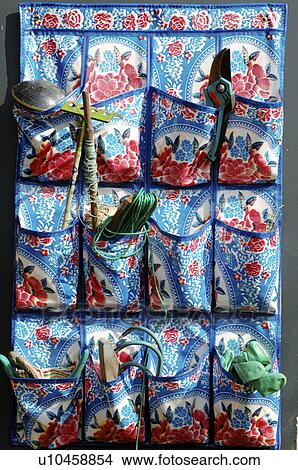 Picture - Pockets for small gardening tools. Fotosearch
