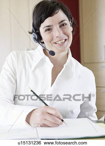 Stock Photograph - Receptionist in rehab. Fotosearch