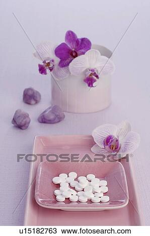 Tissue salts and orchid blossoms View Large Photo Image Stock Image - Tissue salts and orchid blossoms. Fotosearch