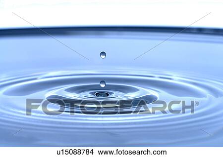 Water drops into water View Large Photo Image Picture - Water drops into water. Fotosearch