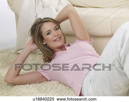 Stock Photography - Woman doing sit ups. Fotosearch