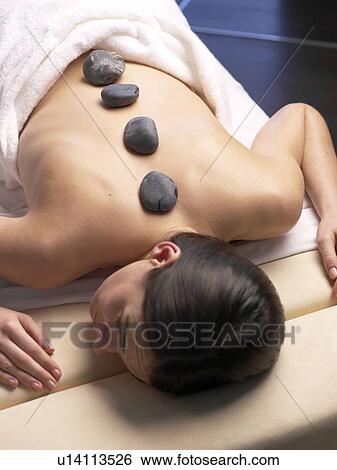 Woman, Hot Stone Massage View Large Photo Image Stock Photograph - Woman, Hot Stone Massage. Fotosearch