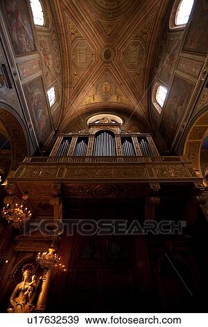 Stock Photo - Church of S. Agostino vaulted ceiling and organ, Rome. Fotosearch
