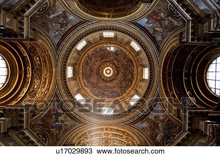 Stock Image - Detail of frescoed cupola interior of church, Sant'Agnese in Agone, Piazza Navona. Fotosearch