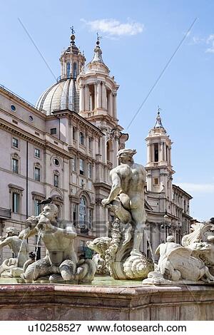 Fontana del Moro, Piazza Navona, with church of Sant'Agnese in Agone beyond, on sunny summer day. View Large Photo Image Stock Photo - Fontana del Moro, Piazza Navona, with church of Sant'Agnese in Agone beyond, on sunny summer day.. Fotosearch