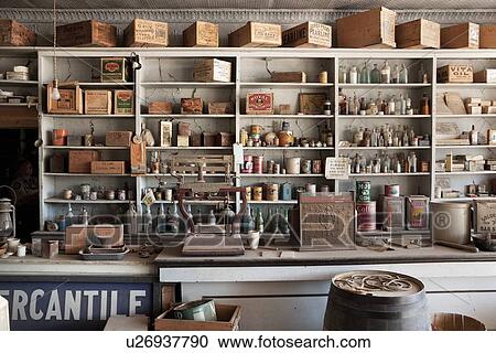 Stock Image - General Store interior with rows of shelves full of items for "purchase", desaturated image, Bodie pioneer village, California. Fotosearch