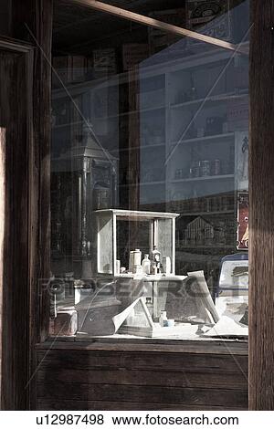 Stock Photo - General Store interior with rows of shelves full of items for "purchase", desaturated image, Bodie pioneer village, California. Fotosearch