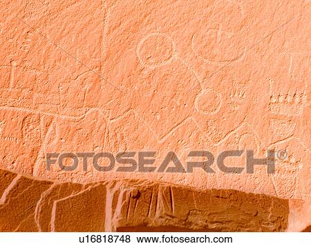 Land of the Sleeping Rainbow canyon: petroglyphs with multiple symbols including the topography of the area, shown by zig zagline, Utah View Large Photo Image Stock Photo - Land of the Sleeping Rainbow canyon: petroglyphs with multiple symbols including the topography of the area, shown by zig zagline, Utah. Fotosearch
