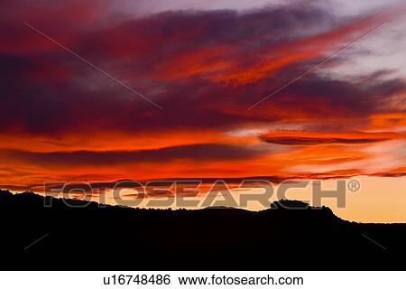 Panorama at Panorama Point, Utah, with dramatic red-purple lenticular cloud formation over silhouetted skyline View Large Photo Image Stock Photograph - Panorama at Panorama Point, Utah, with dramatic red-purple lenticular cloud formation over silhouetted skyline. Fotosearch