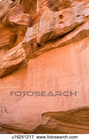 Red rockface with petroglyphs of figures, Pleasant Valley, Utah View Large Photo Image Stock Photo - Red rockface with petroglyphs of figures, Pleasant Valley, Utah. Fotosearch
