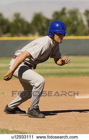 Stock Image - Baseball player running. Fotosearch