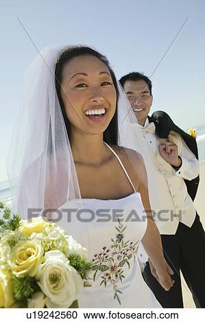 Bride and Groom on beach View Large Photo Image Stock Image - Bride and Groom on beach. Fotosearch