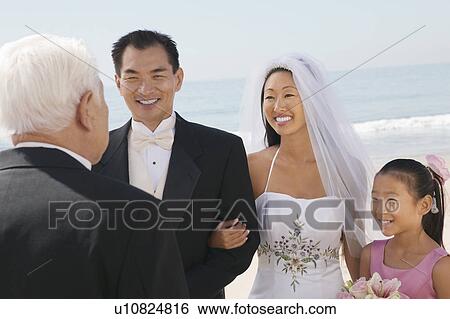 Bride and Groom with family by ocean View Large Photo Image Stock Photograph - Bride and Groom with family by ocean. Fotosearch