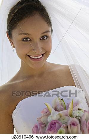 Bride with bouquet, outdoors, (close-up), (portrait) View Large Photo Image Stock Photograph - Bride with bouquet, outdoors, (close-up), (portrait). Fotosearch