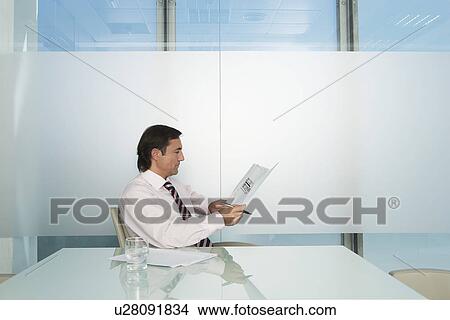 Picture - Businessman working. Fotosearch