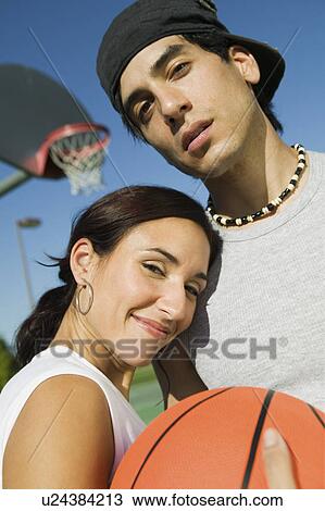 Couple at Basketball Court. View Large Photo Image Stock Image - Couple at Basketball Court.. Fotosearch