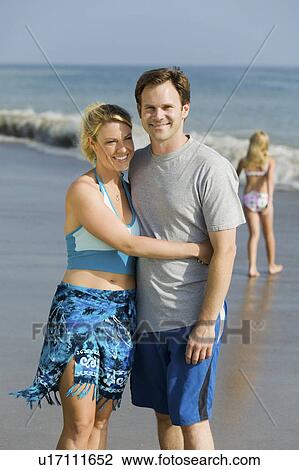 Stock Image - Couple on Beach. Fotosearch