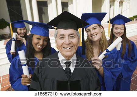 Dean and graduates outside university, elevated view, portrait View Large Photo Image Stock Image - Dean and graduates outside university, elevated view, portrait. Fotosearch