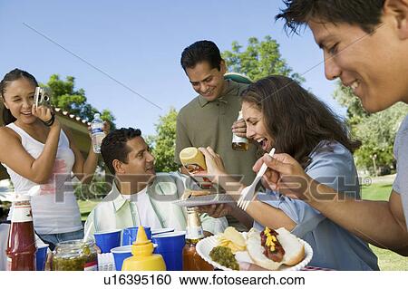 Family at outdoors picnic. View Large Photo Image Stock Image - Family at outdoors picnic.. Fotosearch