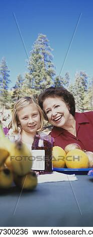 Stock Photograph - Grandmother and Granddaughter. Fotosearch