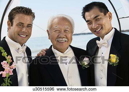 Stock Photograph - Groom with father and best man, outdoors, (portrait). Fotosearch